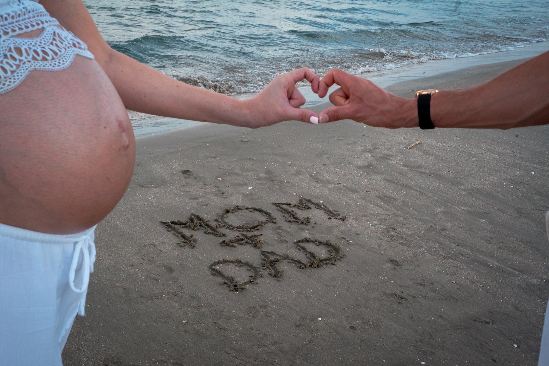 Message écrit dans le sable